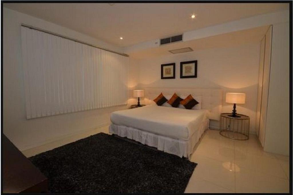Sunset Plaza Apartamentos con servicio Karon Habitación foto