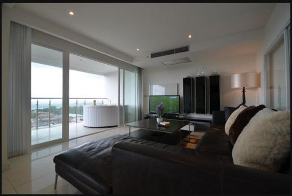 Sunset Plaza Apartamentos con servicio Karon Habitación foto