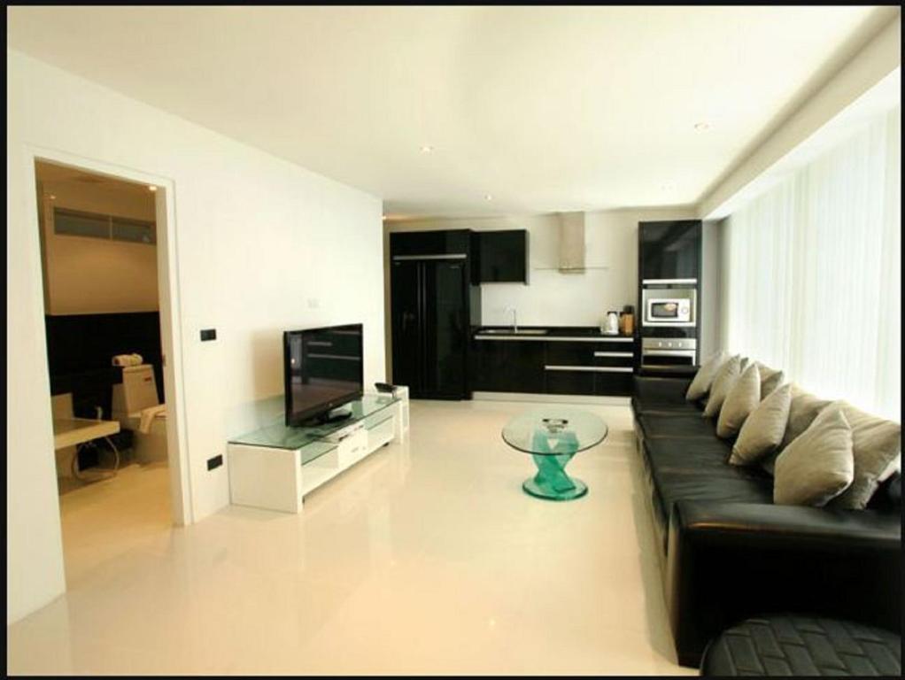 Sunset Plaza Apartamentos con servicio Karon Habitación foto