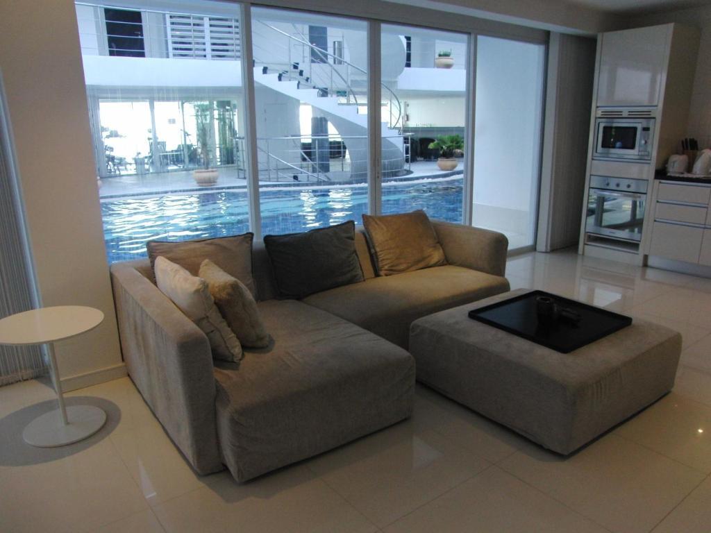 Sunset Plaza Apartamentos con servicio Karon Habitación foto