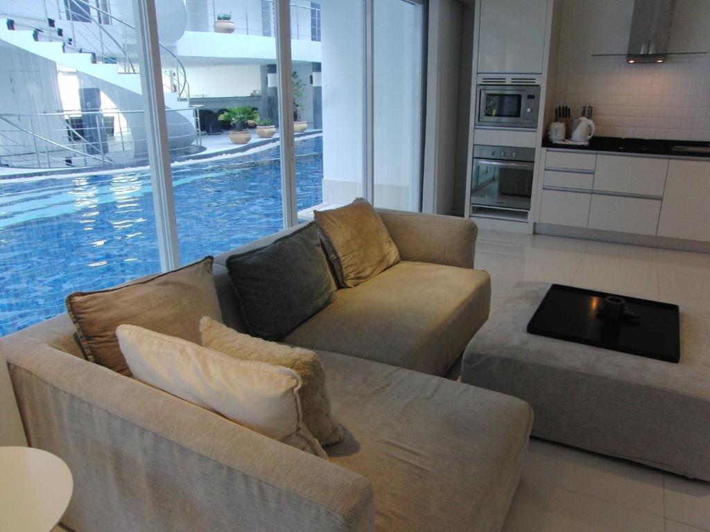 Sunset Plaza Apartamentos con servicio Karon Habitación foto