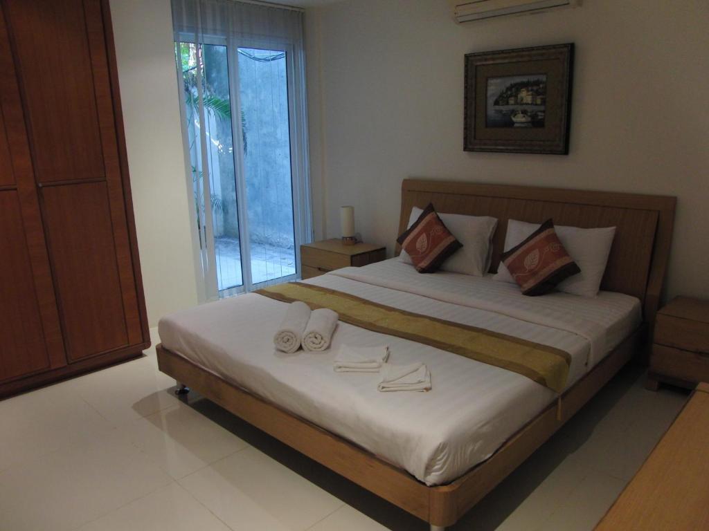 Sunset Plaza Apartamentos con servicio Karon Habitación foto